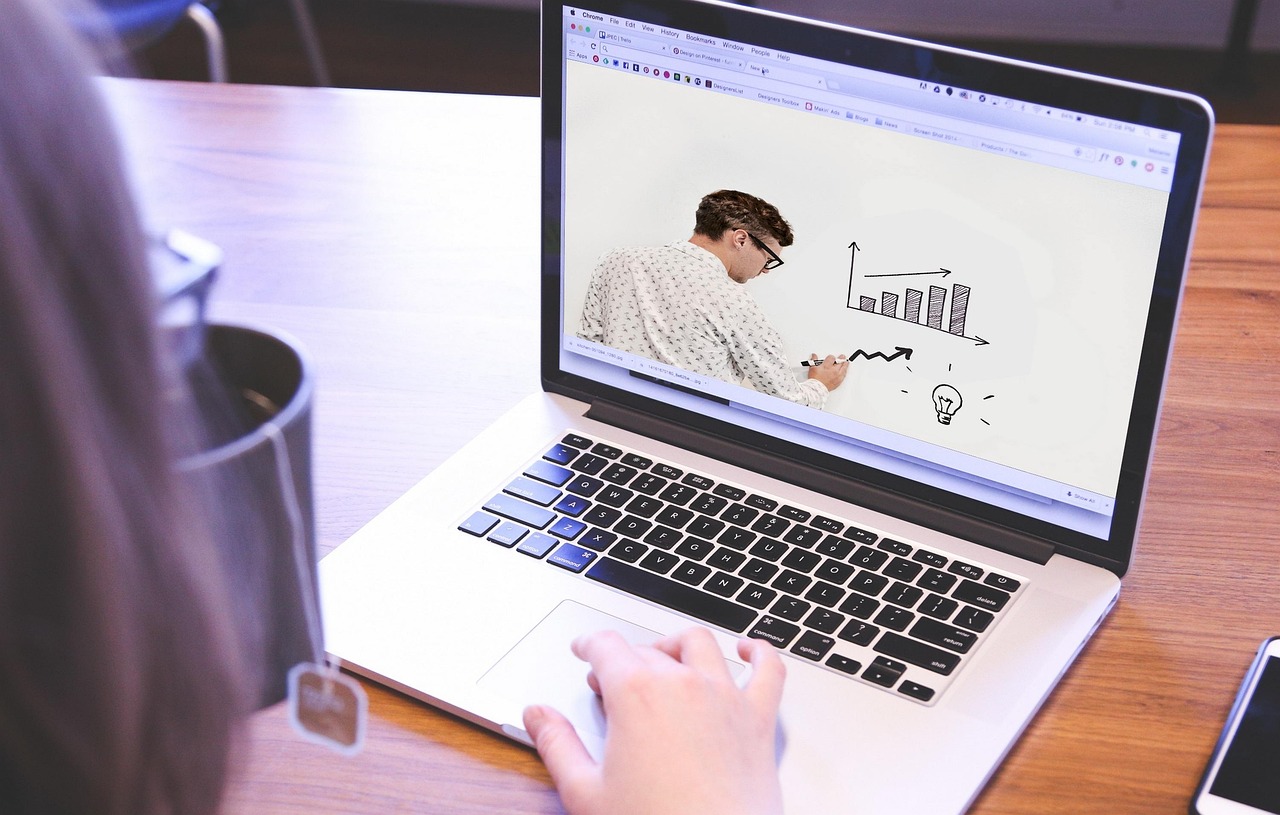 Leader engaging in online MBA course on laptop